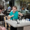 Chess club instructor Harper Smith gives private lessons outside - photo by Austin Fuller